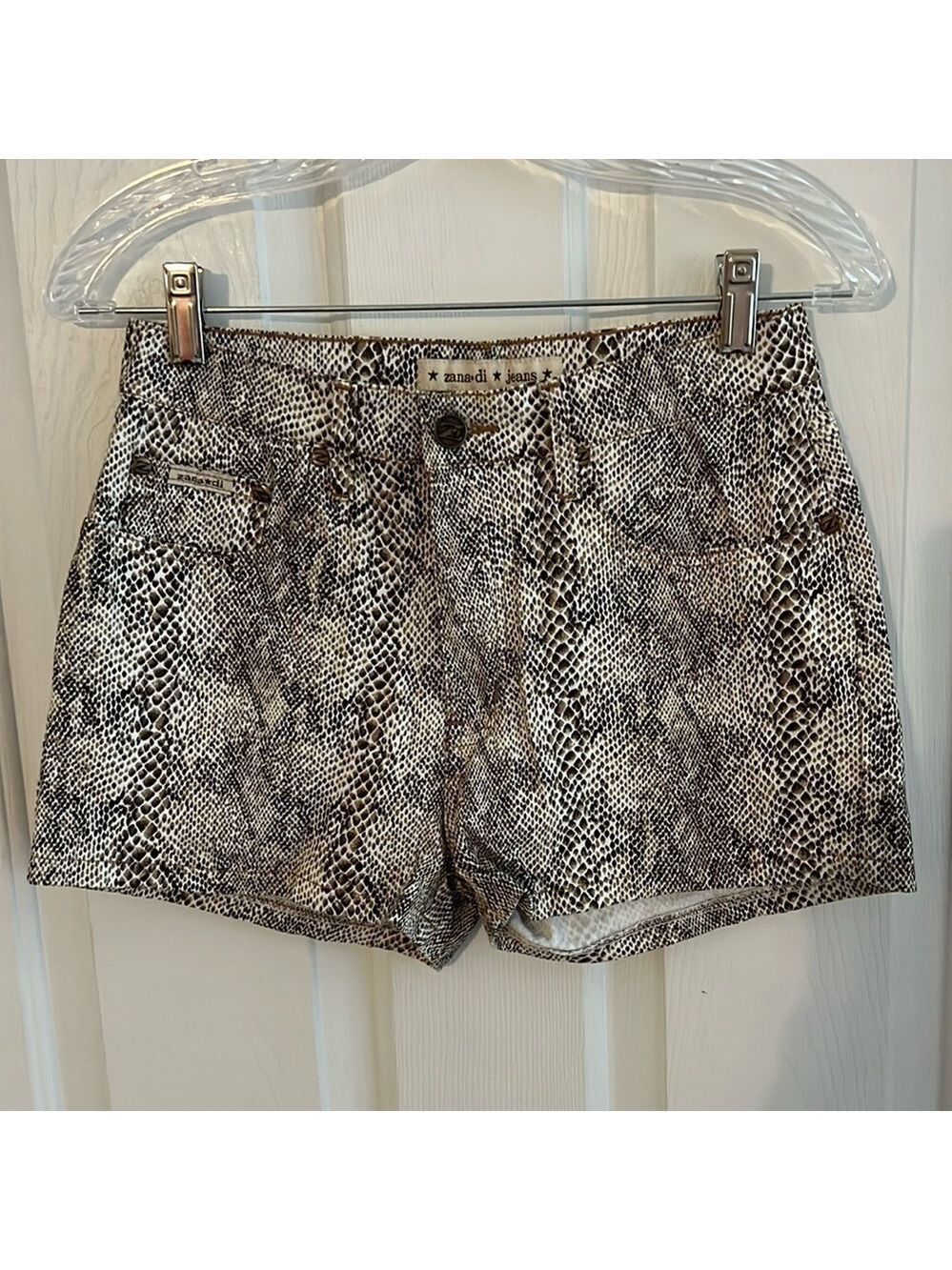 Zana di jeans, shorts, brown animal print. Size 7.